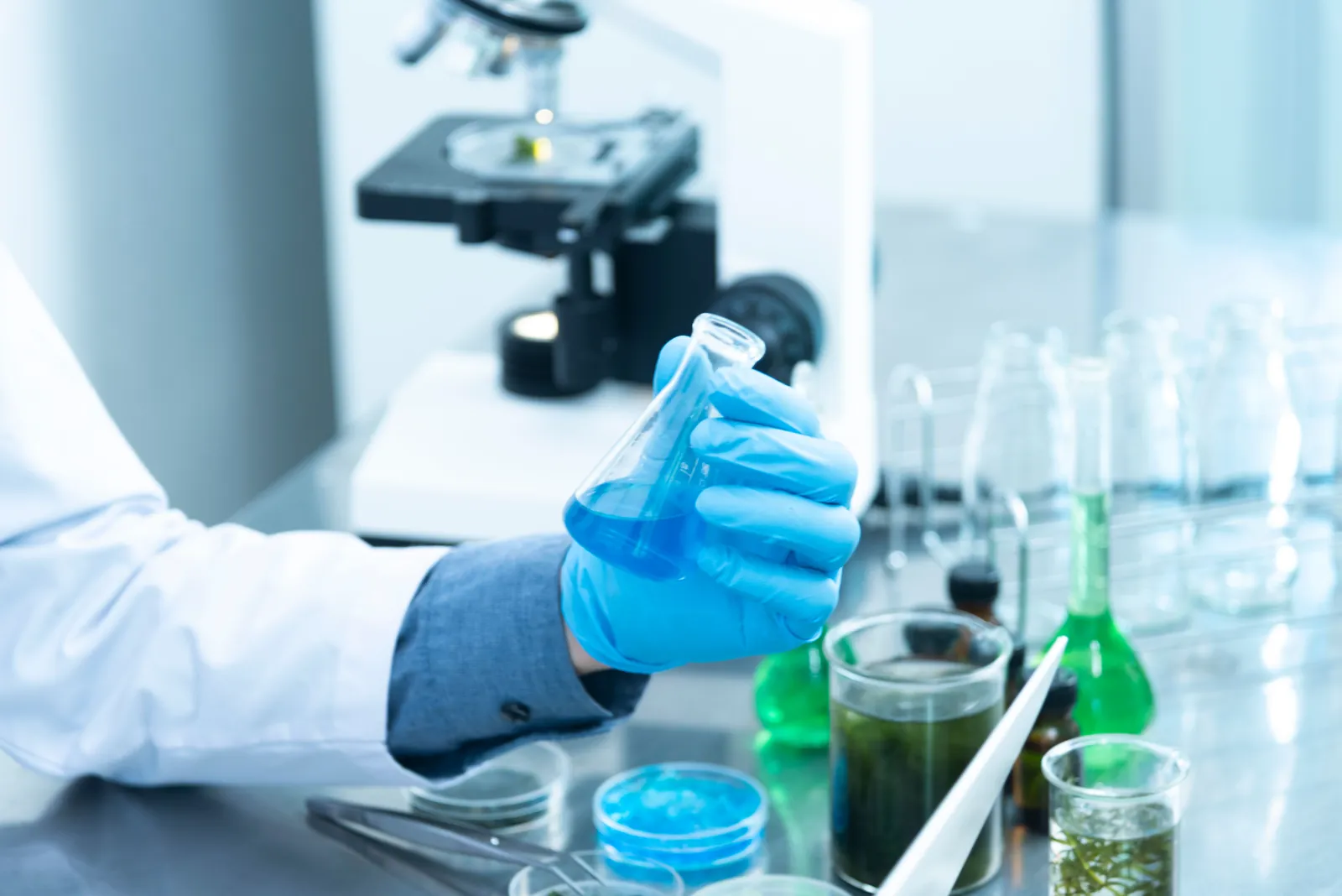 Research professional working with laboratory equipment
